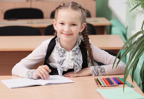 Happy Girl in Classroom