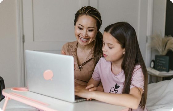 Parent helping child learn